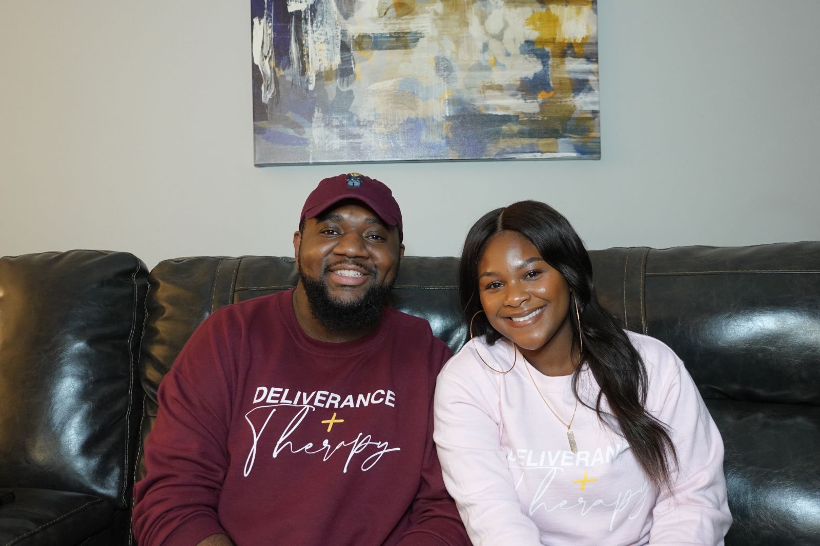 Two friends in Deliverance and Therapy crewnecks